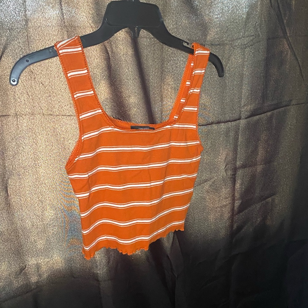 Orange crop top.